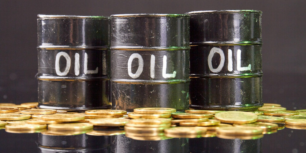 barrels-with-oil-golden-coins-reflective-desk-5