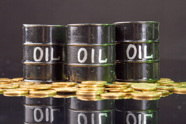 barrels-with-oil-golden-coins-reflective-desk-5