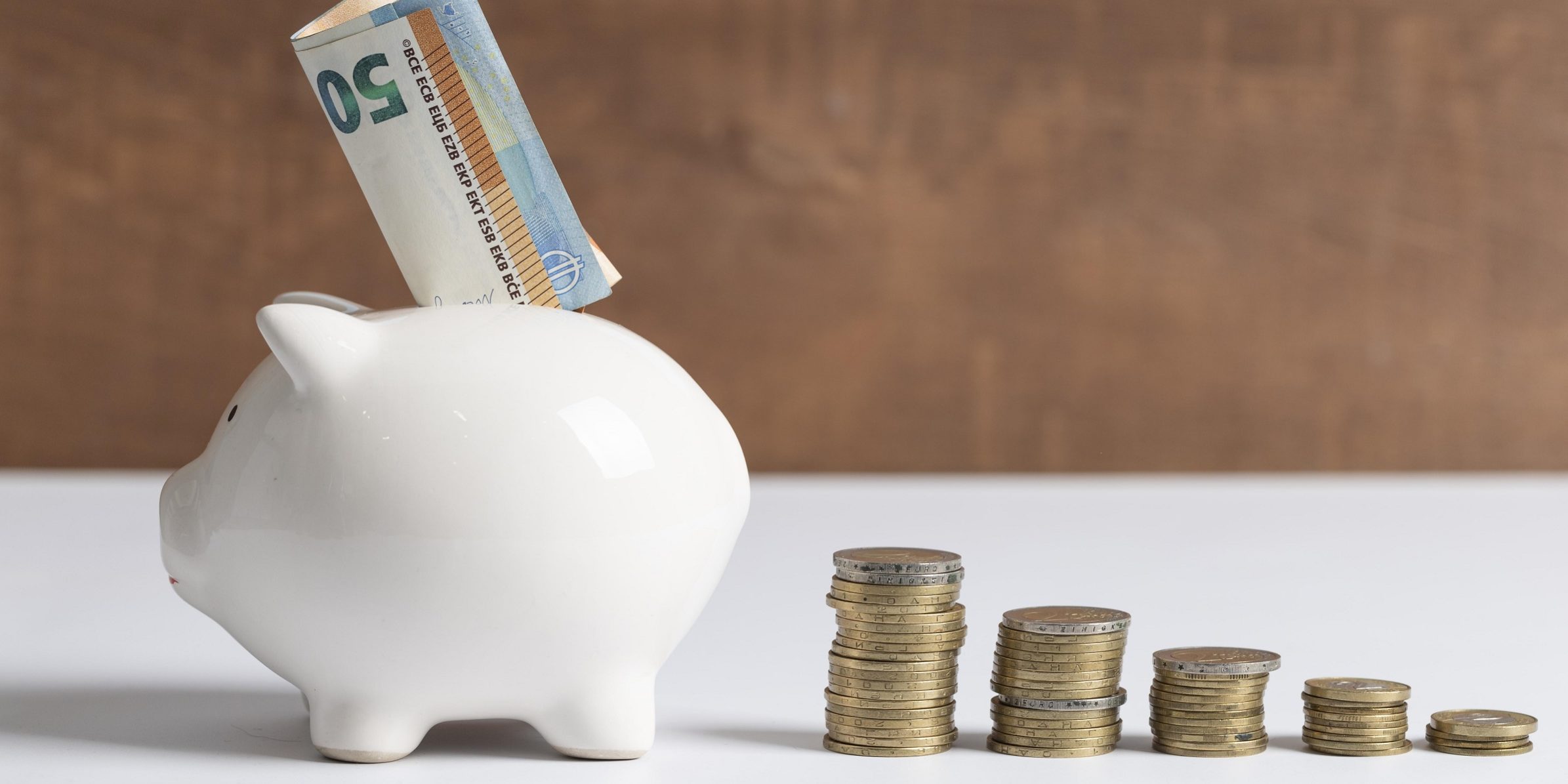 side-view-piggy-bank-with-coins-banknotes-1